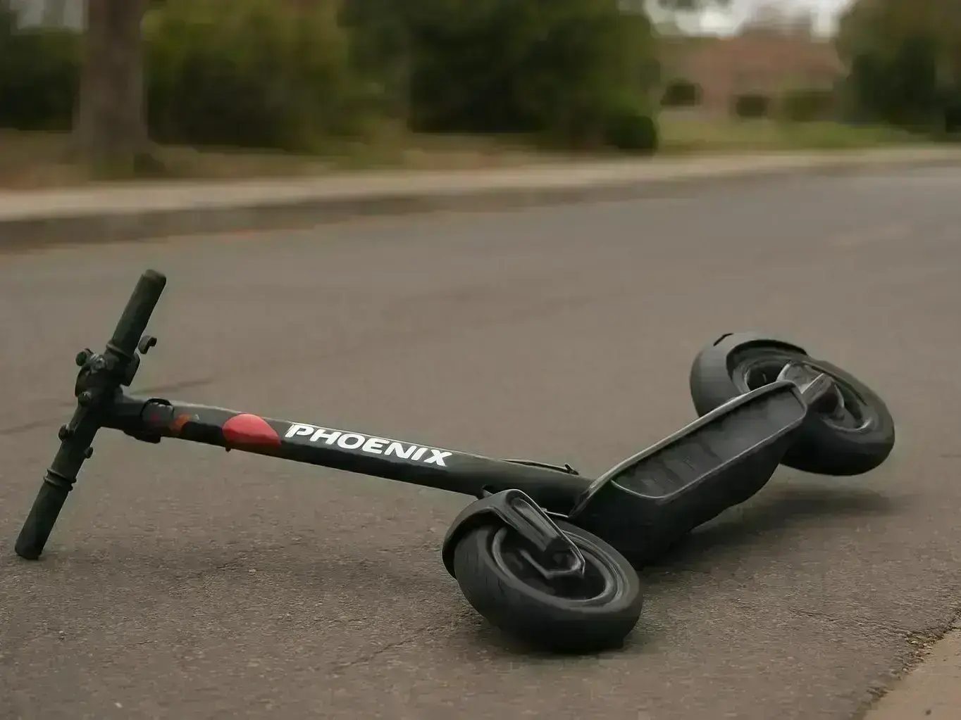 E-scooter accident lawyer reviewing brain injury claim documents near Old Town Peoria AZ